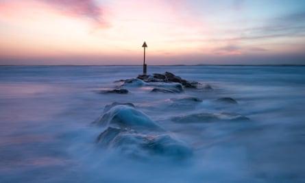 ‘Voted the best sunset-watching spot in the UK’: Sandbanks.
